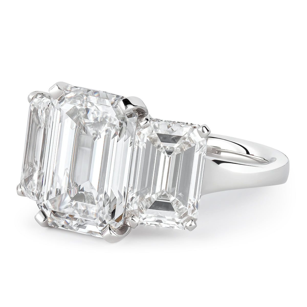 BESPOKE EMERALD CUT THREE STONE RING