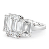 BESPOKE EMERALD CUT THREE STONE RING