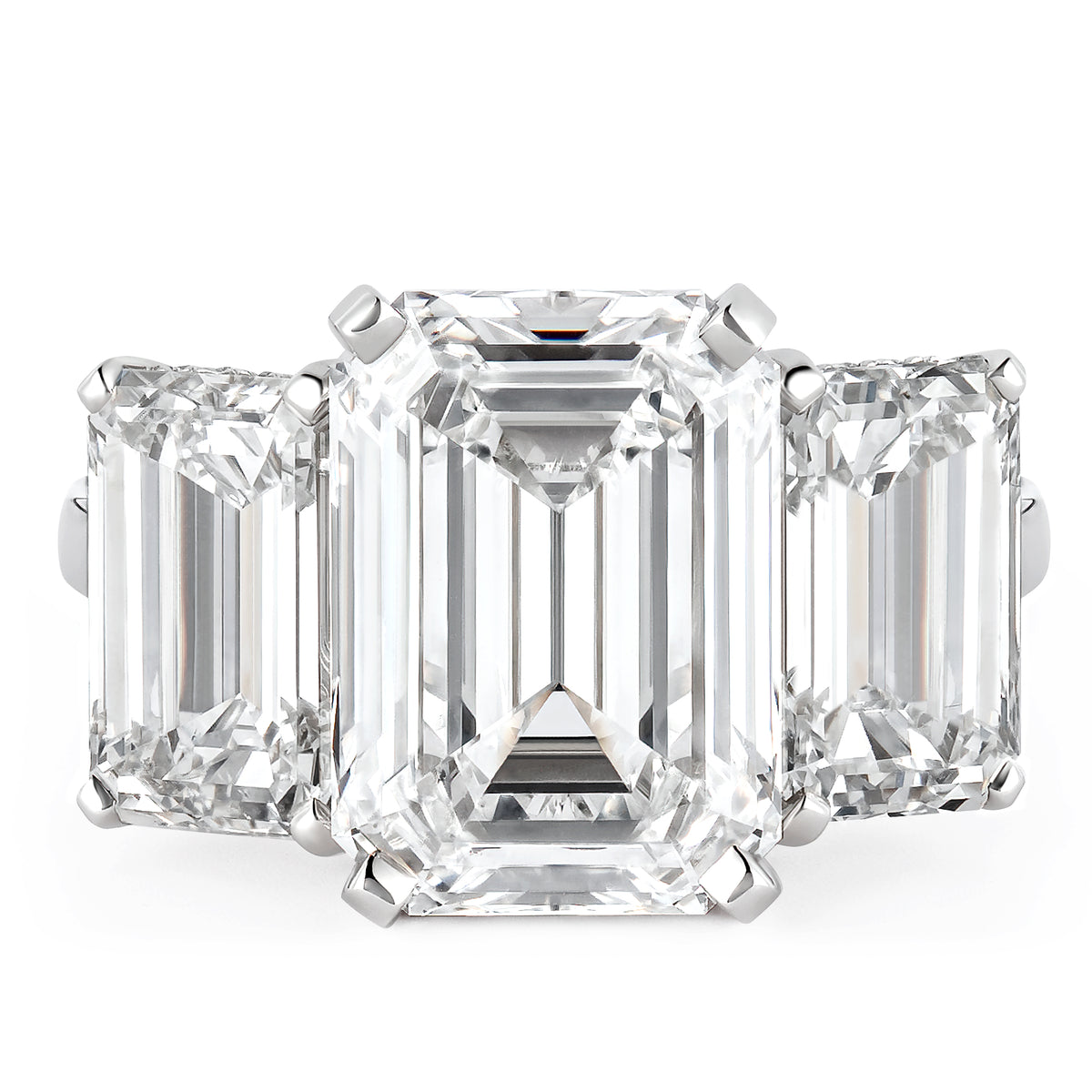 BESPOKE EMERALD CUT THREE STONE RING