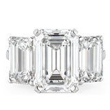 BESPOKE EMERALD CUT THREE STONE RING